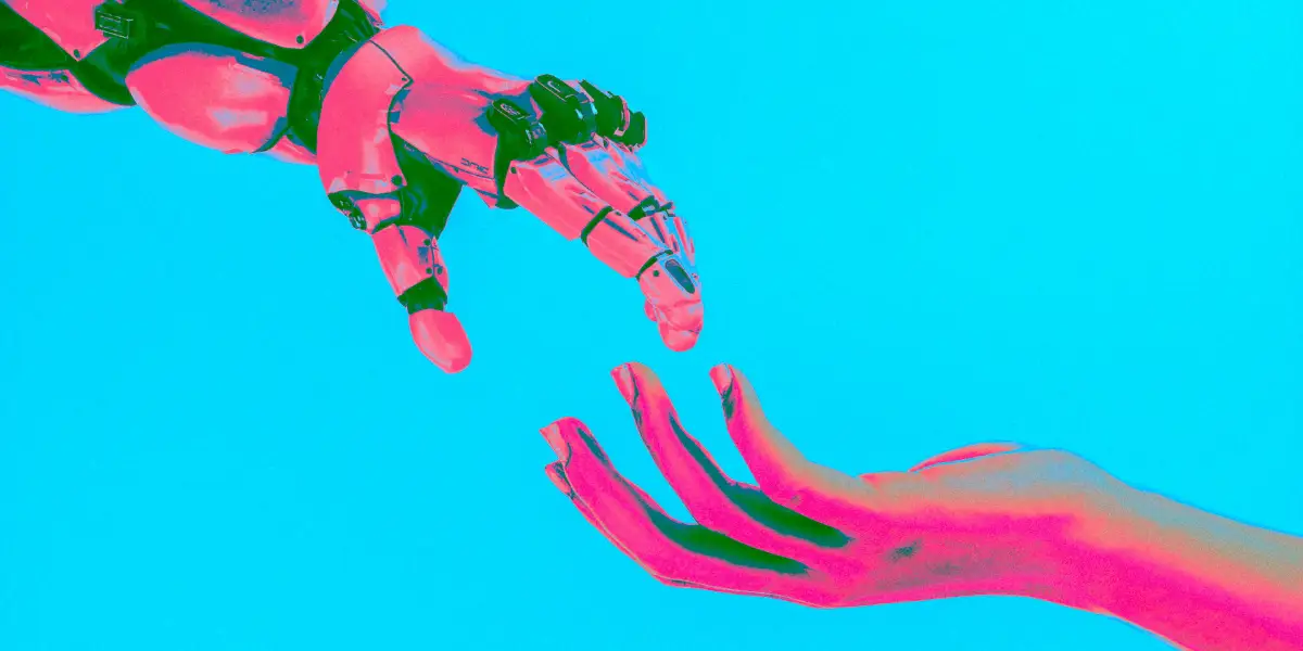 Inimese ja roboti käsi kokku puutumas